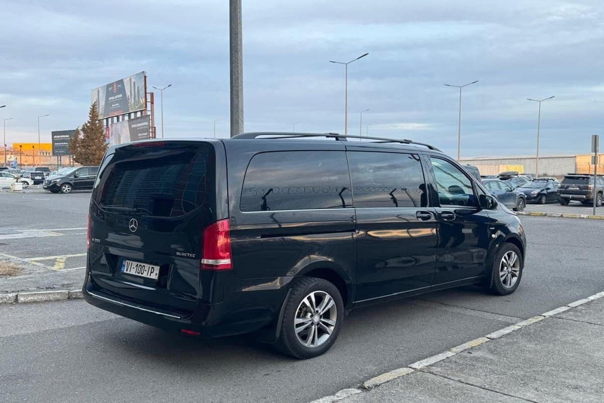 7-seater minivan waiting at Tbilisi airport for passenger pickup