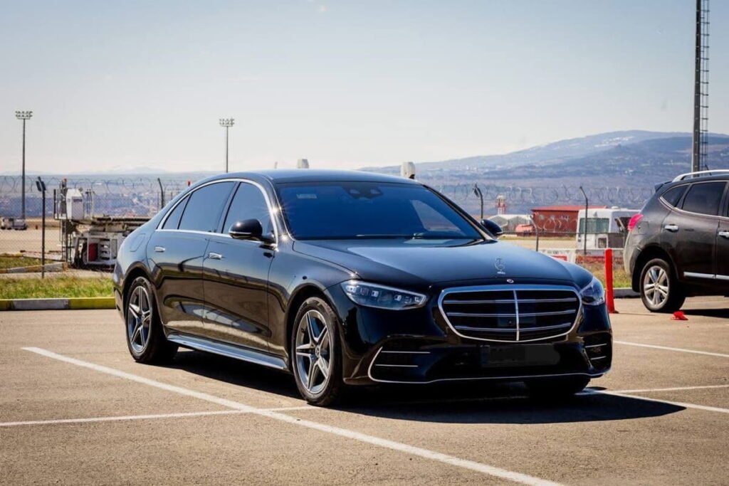 Luxury car rental in Tbilisi Mercedes S-Class with driver at airport